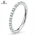 Clickerring met zirkonia's en opalen