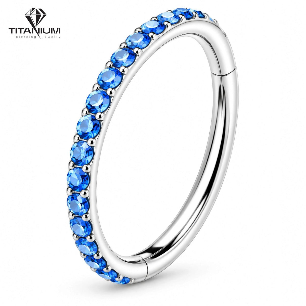 Clicker-Ring mit blauen Zirkonias an der Vorderseite